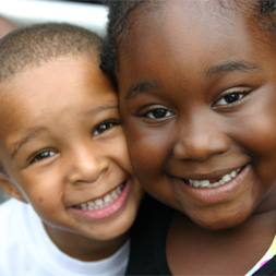 Two beautiful children smiling