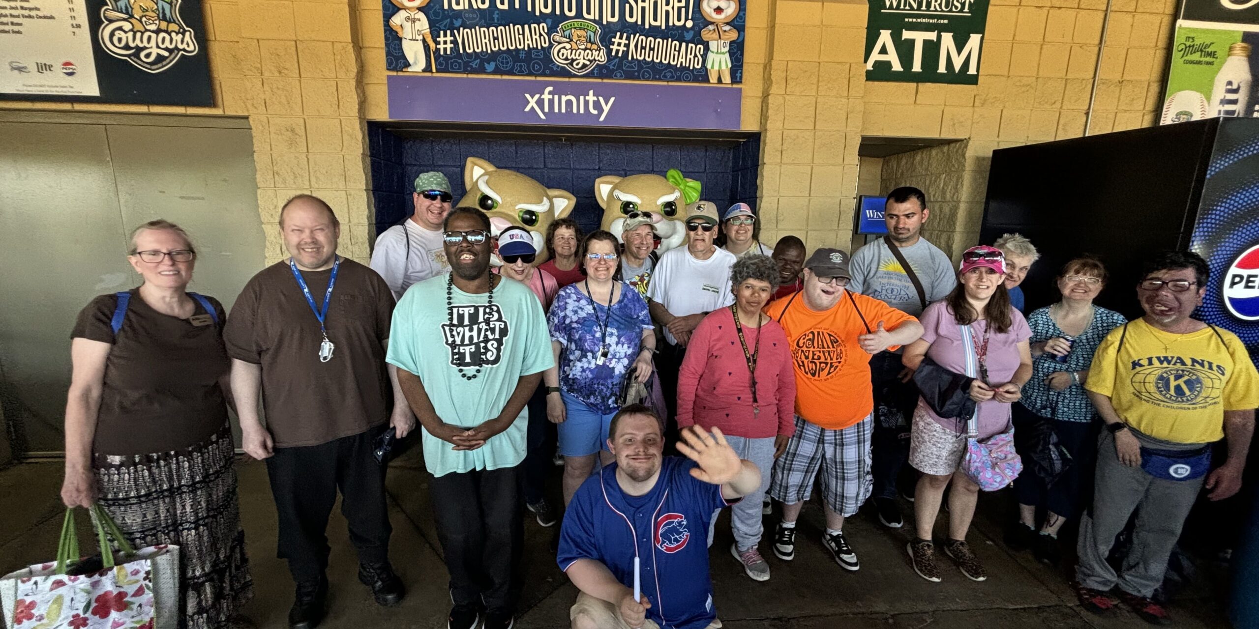 Individuals at a Kane County Cougars baseball game