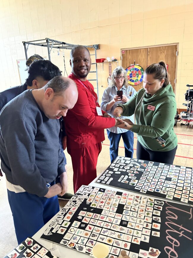 IMG_4743 Individuals getting and browsing temporary tattoos