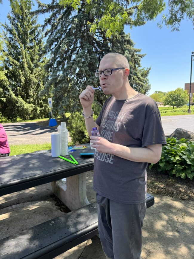 Man blowing bubbles